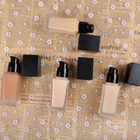Fond de Teint Liquide Multifonction – Haute Couvrance et Fini Naturel